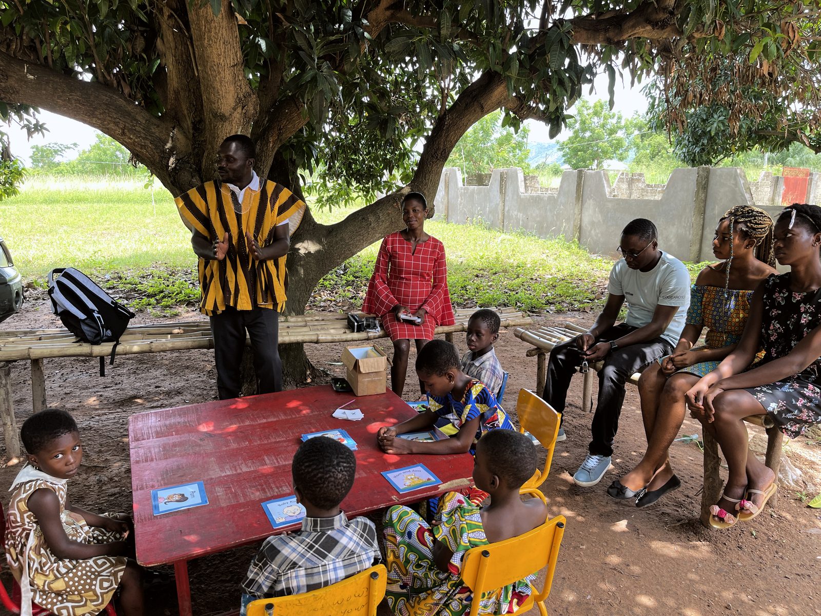 Ghana program leaders teaching under the mango tree